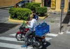 transporte-de-agua-en-motocicleta-la-antigua-guatemala-julio-repartidor-barrio-jocotenango-rev...jpg